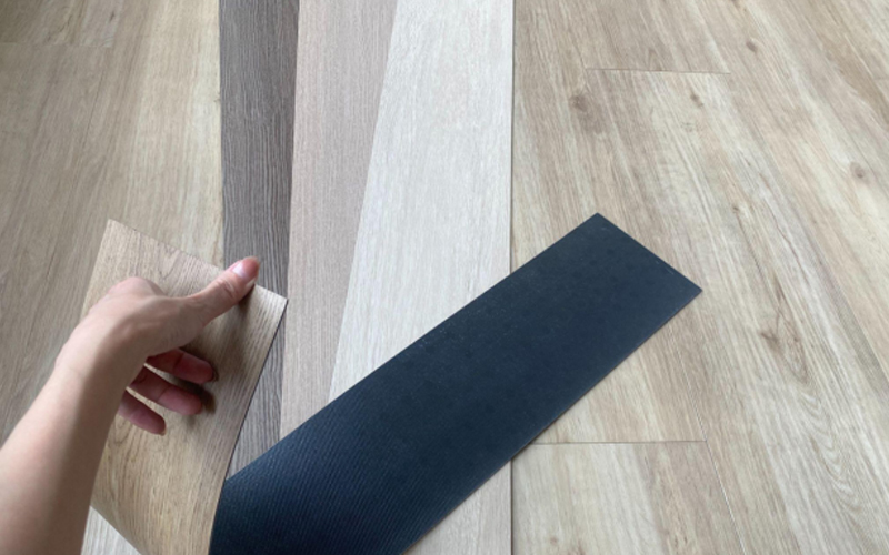  A close-up of a resilient PVC flooring sample: soft and bendable, with a comfortable feel.