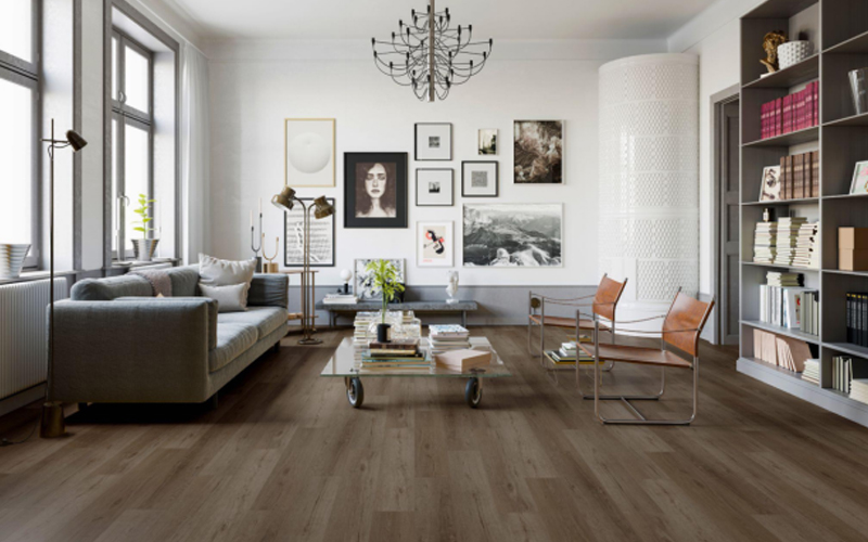 The living room with modern decoration design features dark wood vinyl flooring and white walls.