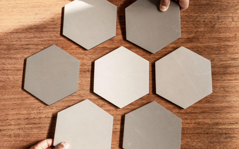 LVT flooring in the styles of wooden planks and hexagonal ceramic tiles.