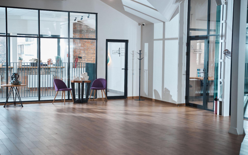 Modern empty office room with LVT floors.
