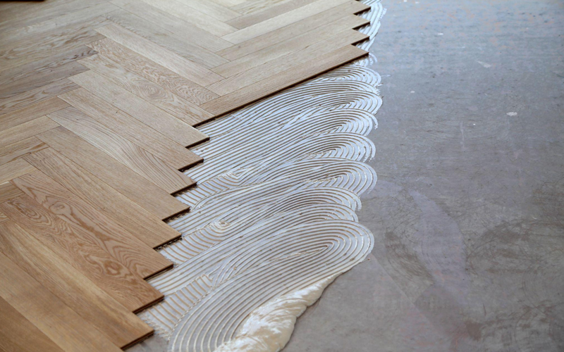 The process of installing herringbone pattern LVT flooring