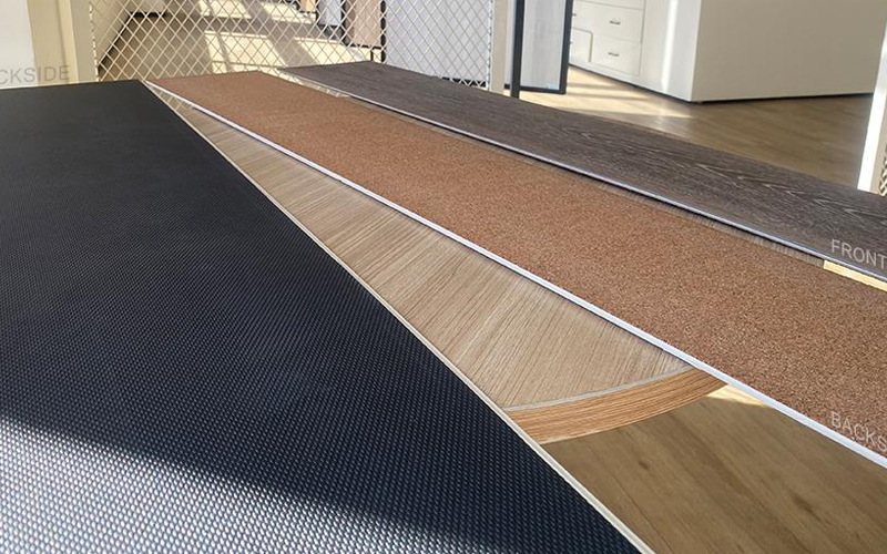 WPC flooring samples with two different backing types